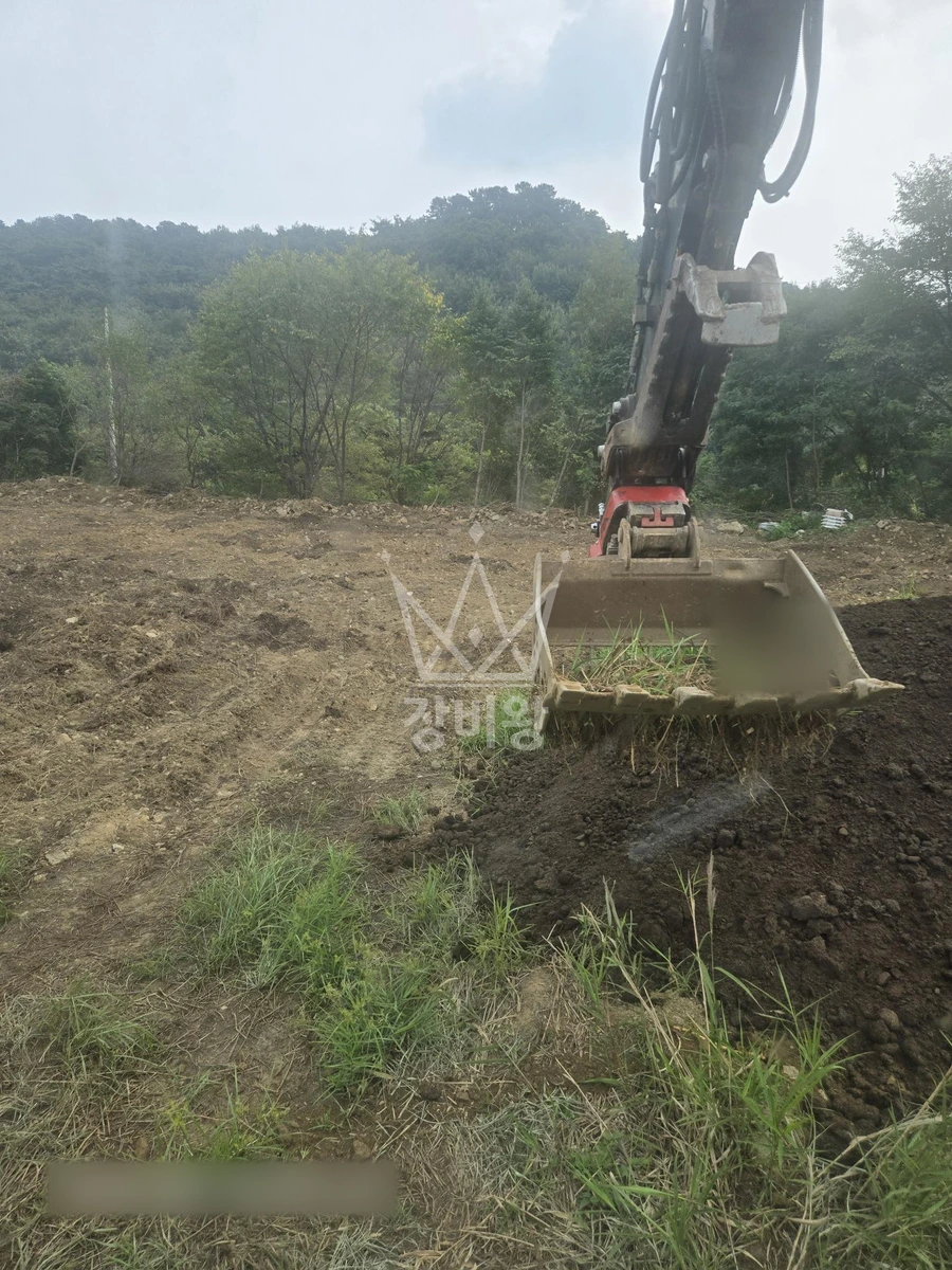 충남 천안시 동남구 광덕면 포크레인(굴착기) 돌 분리(고르는) 작업 작업사진 3