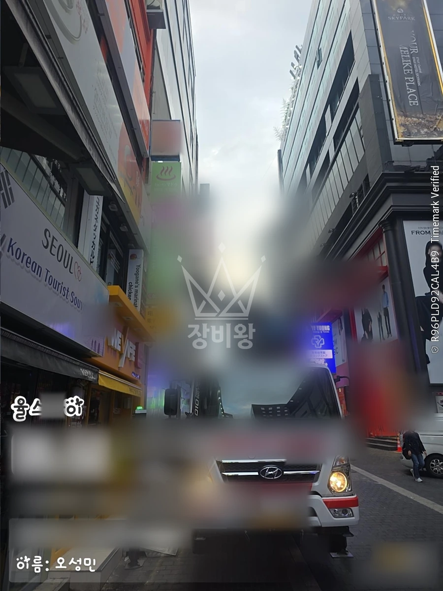 서울 중구 충무로1가 3.5톤 스카이차 유리청소 작업사진 1
