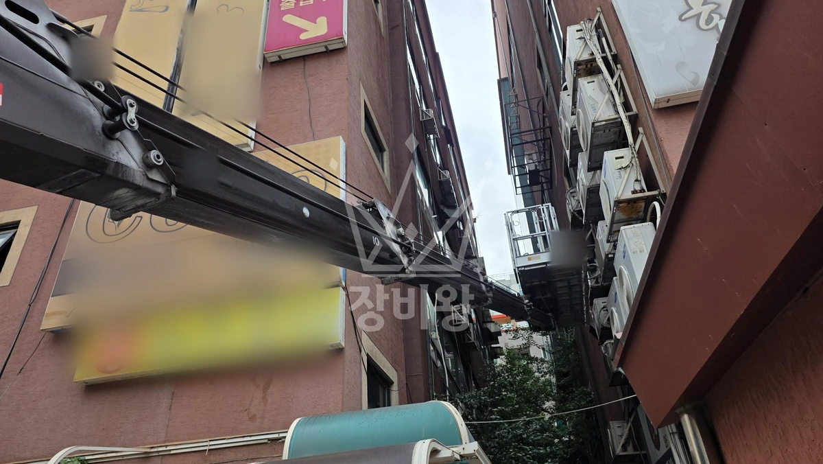 충남 천안시 서북구 성정동 1톤 스카이차 에어컨 실외기 철거 및 설치 작업사진 2