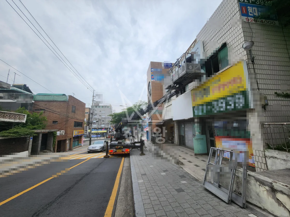 서울 성북구 보문동3가 3.5톤 스카이차 간판 천갈이, 등교체 작업사진 1